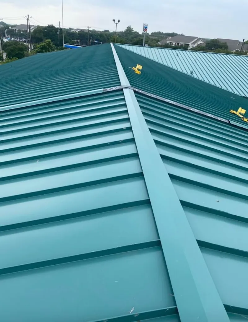 Green commercial metal roof ridge and valley for Metal Roof Repair in Arab